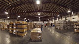 A well-organized and high-paying warehouse with neatly stacked pallets. A well-organized and high-paying warehouse with neatly stacked pallets.